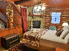 loft bedroom with fireplace