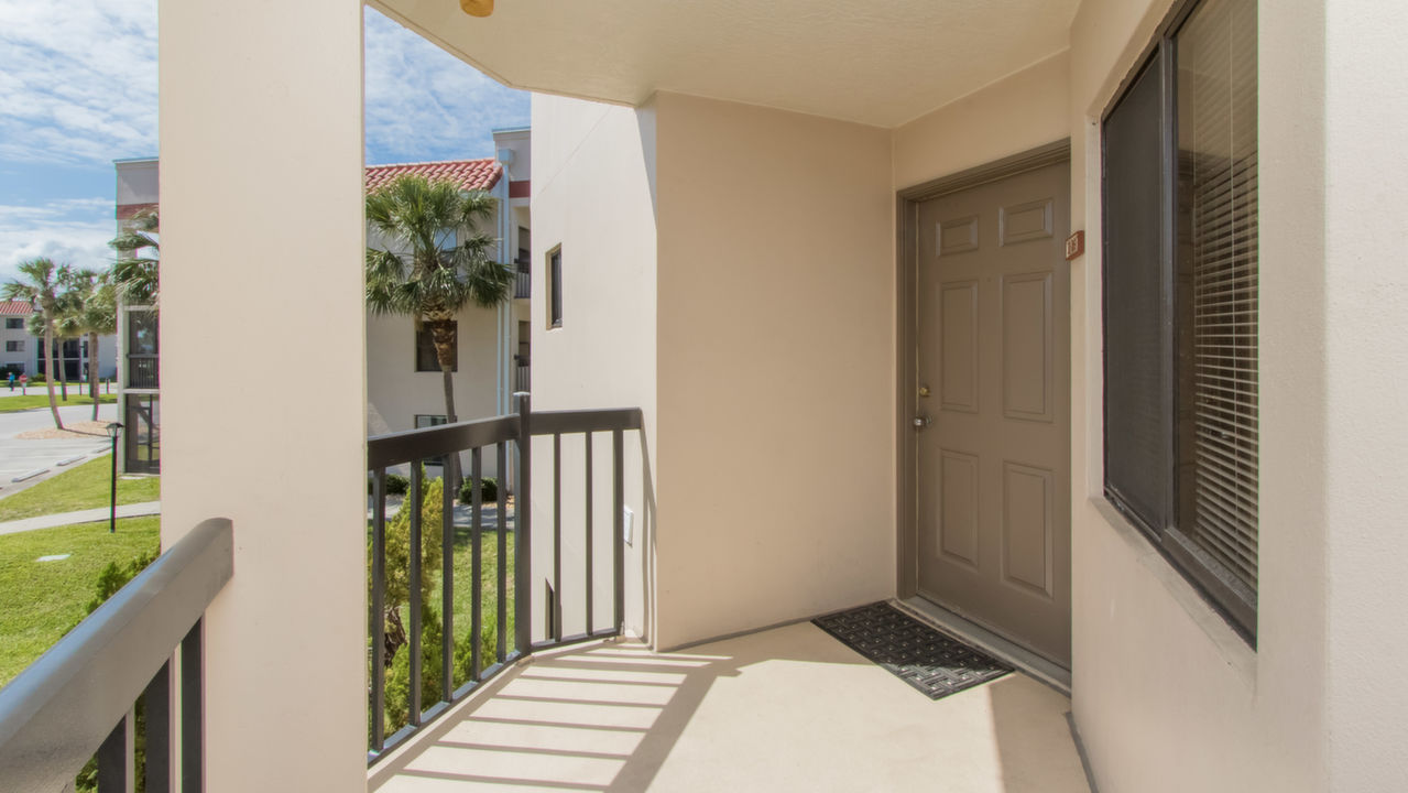 bALCONY LEADS TO FRONT DOOR